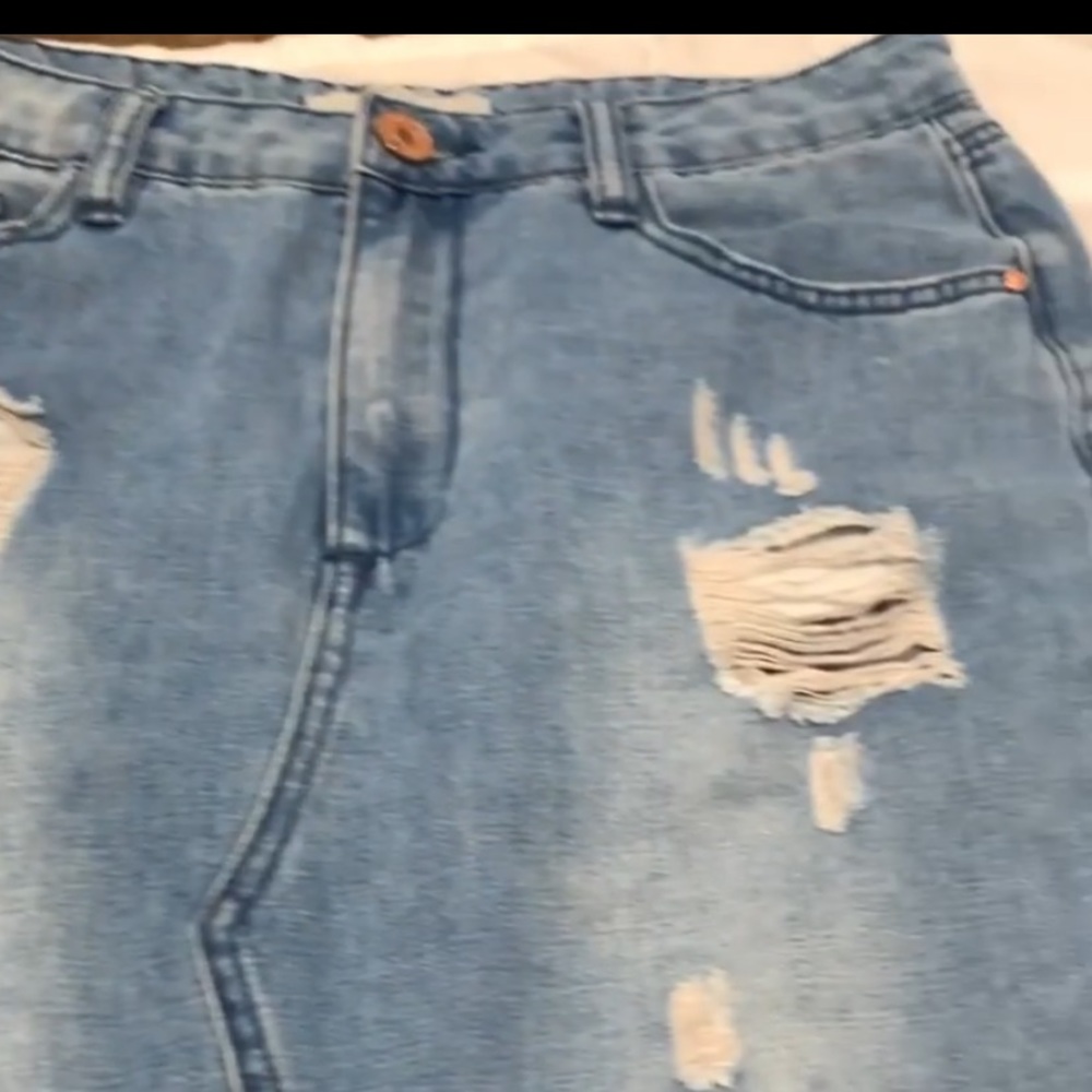 Distressed jean skirt